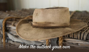 Acubra hat resting on wicker box